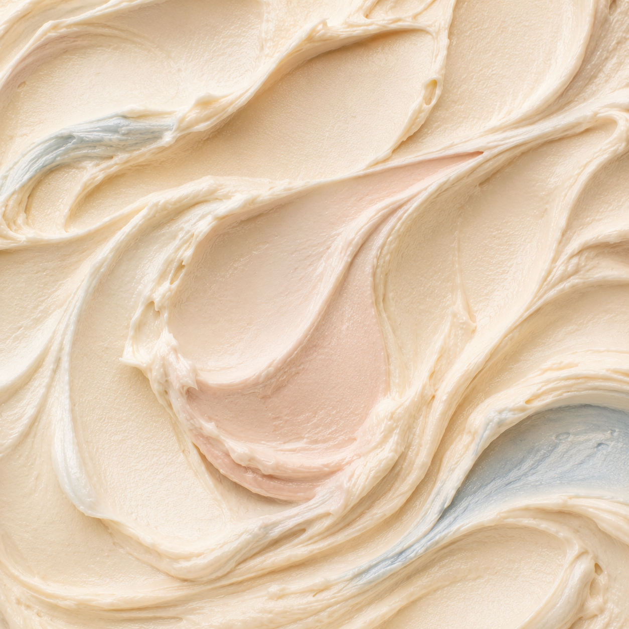 Close-up of creamy beige and blue swirled texture
