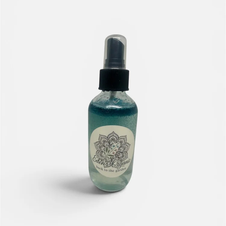 Spray bottle with a label on a white background
